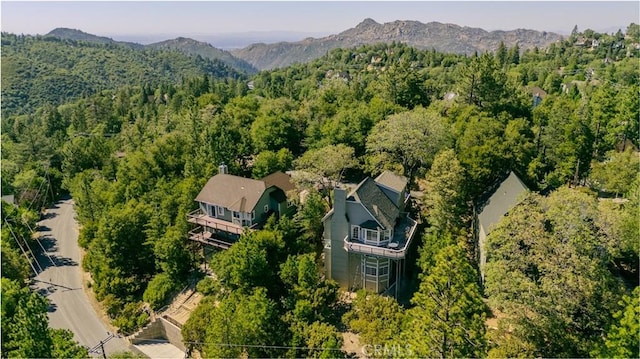 915 Breithorn Dr, Lake Arrowhead, CA 92352 - aerial view of property and surrounding area featuring a forest and a mountainous background
