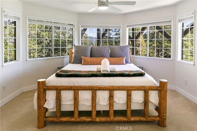 915 Breithorn Dr, Lake Arrowhead, CA 92352 - bedroom featuring light colored carpet, multiple windows, and a ceiling fan