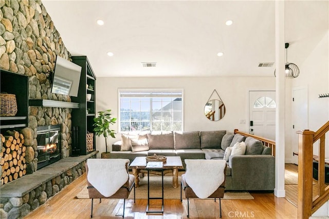 915 Breithorn Dr, Lake Arrowhead, CA 92352 - living room with wood finished floors, a fireplace, and recessed lighting