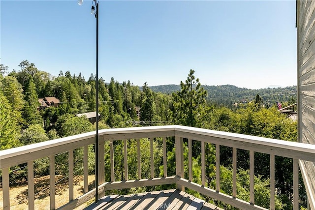 915 Breithorn Dr, Lake Arrowhead, CA 92352 - balcony featuring a view of trees