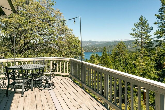 915 Breithorn Dr, Lake Arrowhead, CA 92352 - deck featuring outdoor dining area and a water and mountain view