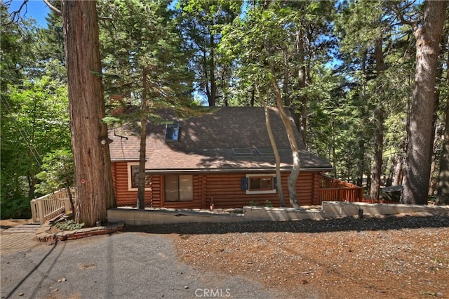 788 Buckingham Sq, Lake Arrowhead, CA 92352 - view of front of home with log exterior and a shingled roof