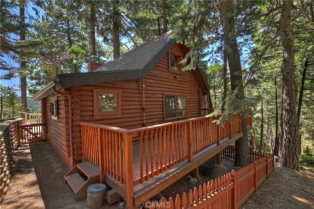 788 Buckingham Sq, Lake Arrowhead, CA 92352 - rear view of house featuring log siding and a deck