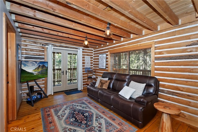 788 Buckingham Sq, Lake Arrowhead, CA 92352 - living room with french doors, log walls, hardwood / wood-style floors, and a wood ceiling with exposed beams