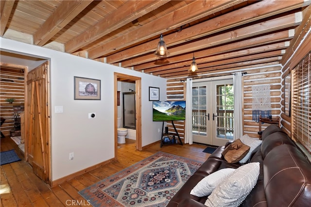 788 Buckingham Sq, Lake Arrowhead, CA 92352 - living area with french doors, rustic walls, wood-type flooring, and beam ceiling