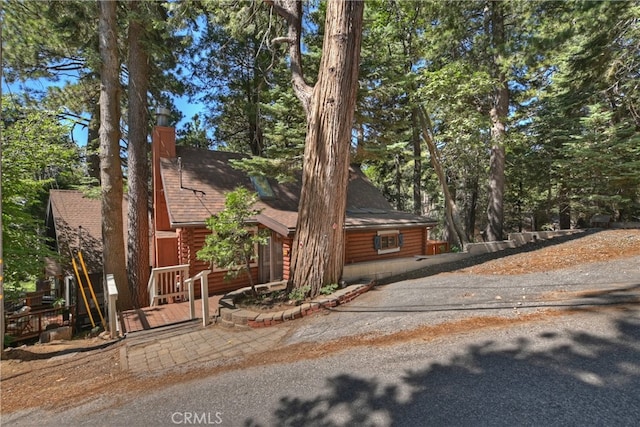 788 Buckingham Sq, Lake Arrowhead, CA 92352 - cabin featuring roof with shingles and log veneer siding