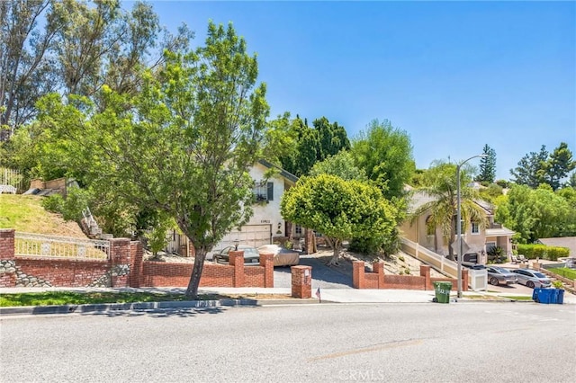 11922 Louise Ave, Granada Hills, CA 91344 - obstructed view of property with stucco siding