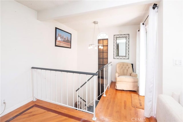 9228 Elm Vista Dr Unit B, Downey, CA 90242 - corridor with an upstairs landing, wood finished floors, and beam ceiling