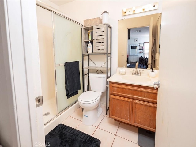9228 Elm Vista Dr Unit B, Downey, CA 90242 - full bathroom with vanity, a shower stall, and tile patterned flooring