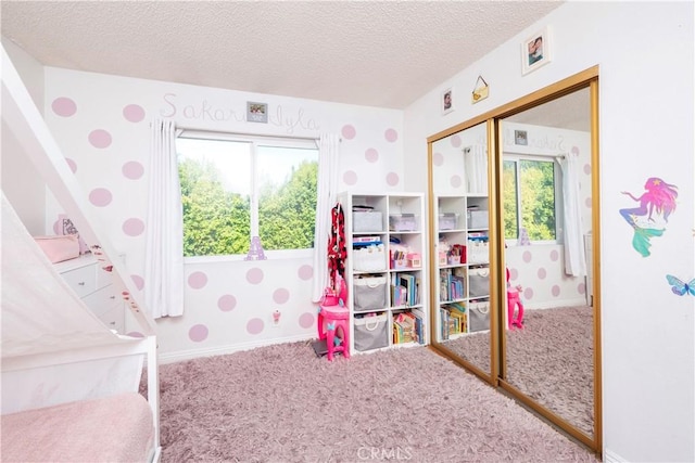 9228 Elm Vista Dr Unit B, Downey, CA 90242 - bedroom featuring carpet flooring, a textured ceiling, and a closet