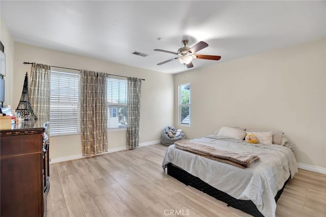 434 Sonora Cir, Redlands, CA 92373 - bedroom featuring light wood-type flooring and ceiling fan