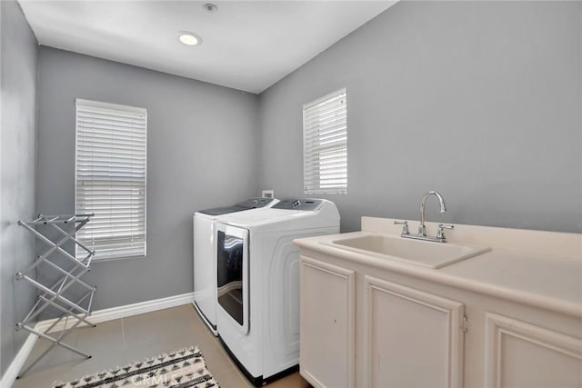 434 Sonora Cir, Redlands, CA 92373 - washroom featuring washing machine and clothes dryer and cabinet space