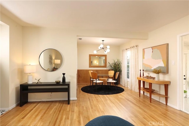 8220 Owens St, Sunland, CA 91040 - living area with wood finished floors and a chandelier