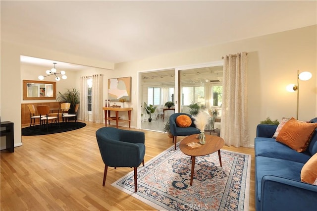 8220 Owens St, Sunland, CA 91040 - living room with a chandelier and light wood finished floors