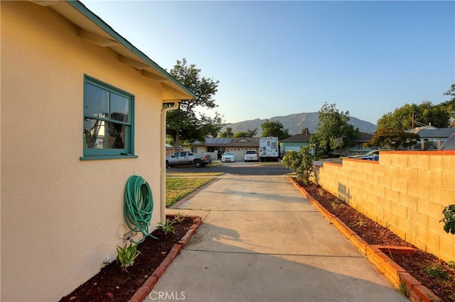 8220 Owens St, Sunland, CA 91040 - view of yard with concrete driveway and a mountain view