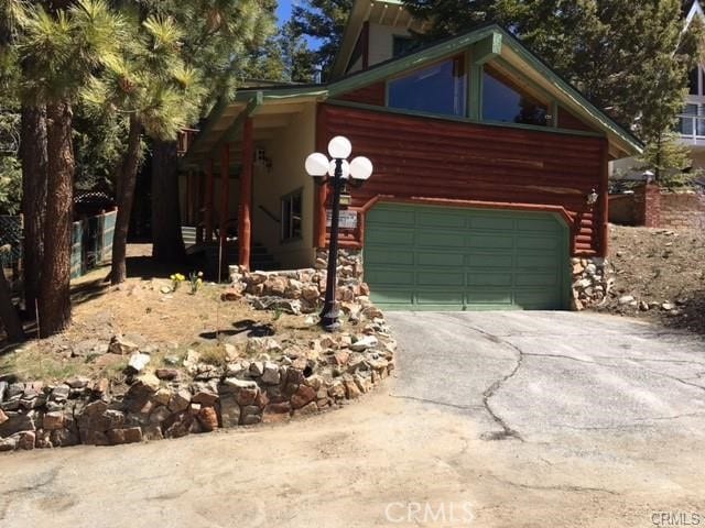 847 Tehama Dr, Big Bear Lake, CA 92315 - view of front of house with driveway and an attached garage