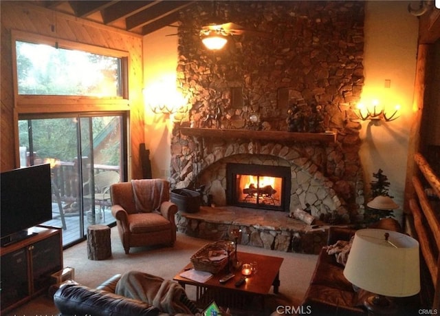 847 Tehama Dr, Big Bear Lake, CA 92315 - living room with a stone fireplace, carpet floors, and a ceiling fan