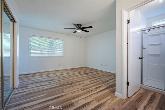 2950 Marie Ln, Merced, CA 95340 - unfurnished bedroom featuring light wood-style floors, a closet, and ceiling fan