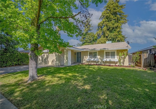 2950 Marie Ln, Merced, CA 95340 - view of front of house with a garage, driveway, and stucco siding