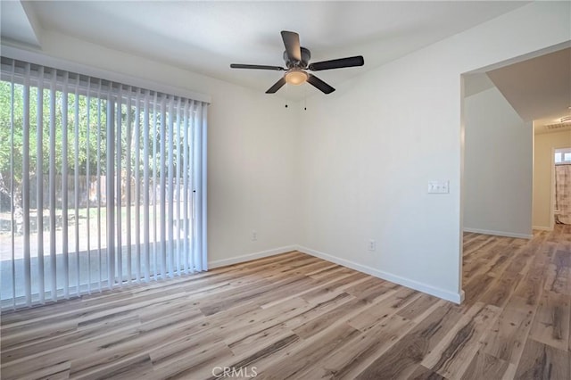 2950 Marie Ln, Merced, CA 95340 - empty room with a ceiling fan and wood finished floors