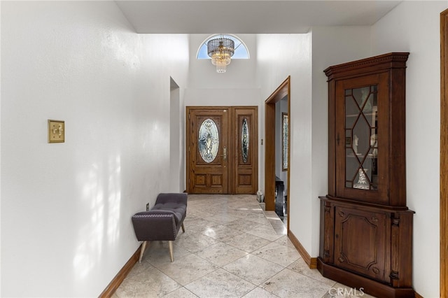981 Deep Springs Dr, Claremont, CA 91711 - foyer with a chandelier, a high ceiling, and healthy amount of natural light