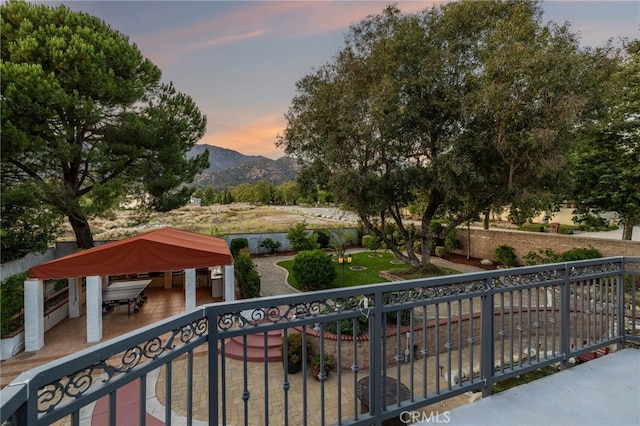 981 Deep Springs Dr, Claremont, CA 91711 - balcony at dusk featuring a mountain view
