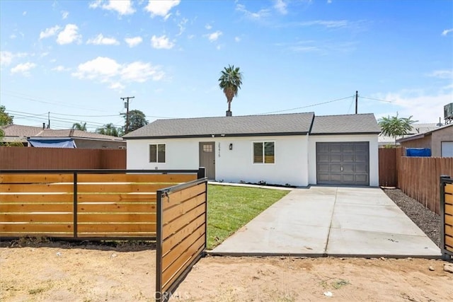 25415 Paloma Rd, San Bernardino, CA 92410 - single story home with an attached garage, concrete driveway, and stucco siding