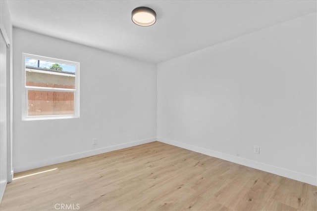 25415 Paloma Rd, San Bernardino, CA 92410 - spare room with wood finished floors and baseboards