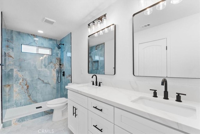 25415 Paloma Rd, San Bernardino, CA 92410 - full bathroom featuring double vanity and a marble finish shower