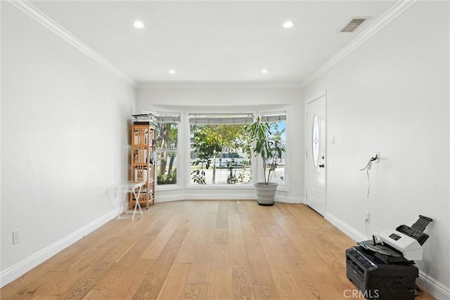 4752 Josie Ave, Lakewood, CA 90713 - foyer with light wood-style floors, recessed lighting, and ornamental molding