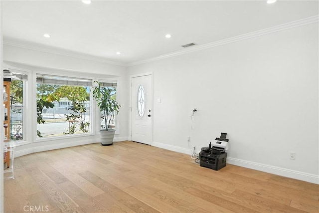 4752 Josie Ave, Lakewood, CA 90713 - entryway featuring light wood-type flooring, crown molding, and recessed lighting