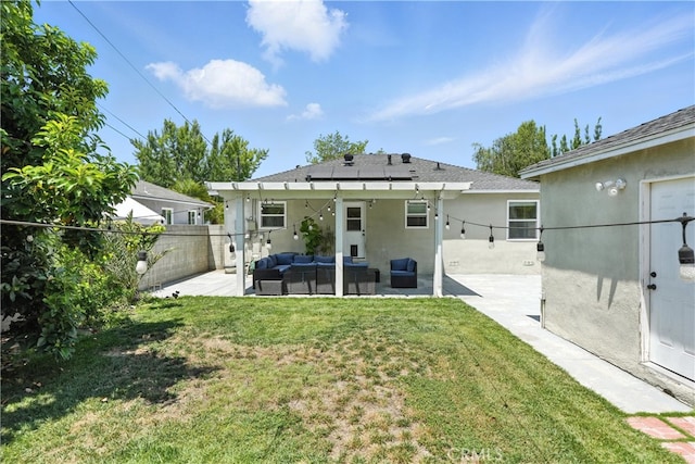 4752 Josie Ave, Lakewood, CA 90713 - back of house with an outdoor living space, solar panels, stucco siding, a patio area, and a fenced backyard