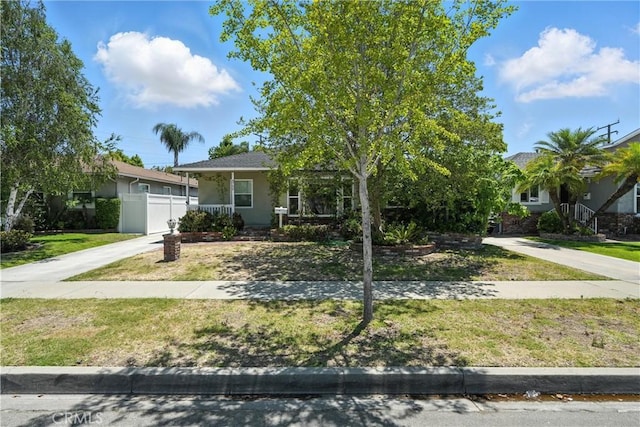 4752 Josie Ave, Lakewood, CA 90713 - view of front facade featuring stucco siding and driveway