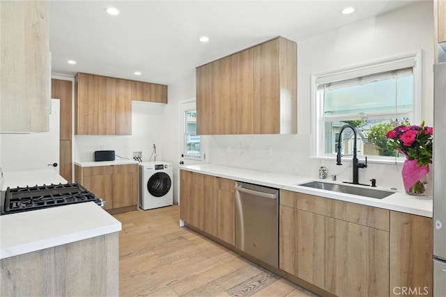 4752 Josie Ave, Lakewood, CA 90713 - kitchen with washer / clothes dryer, stainless steel dishwasher, modern cabinets, range with gas cooktop, and recessed lighting