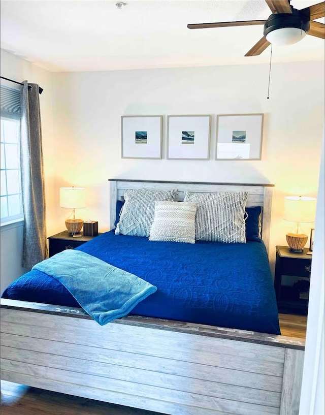 444 Pier Ave Unit 4, Oceano, CA 93445 - bedroom featuring a ceiling fan and wood finished floors
