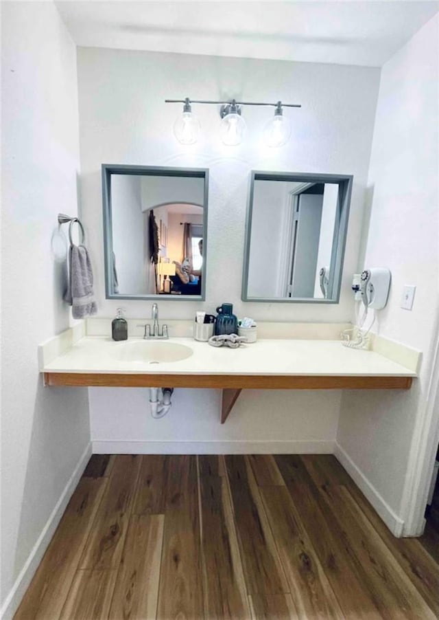 444 Pier Ave Unit 4, Oceano, CA 93445 - bathroom with a sink and wood finished floors
