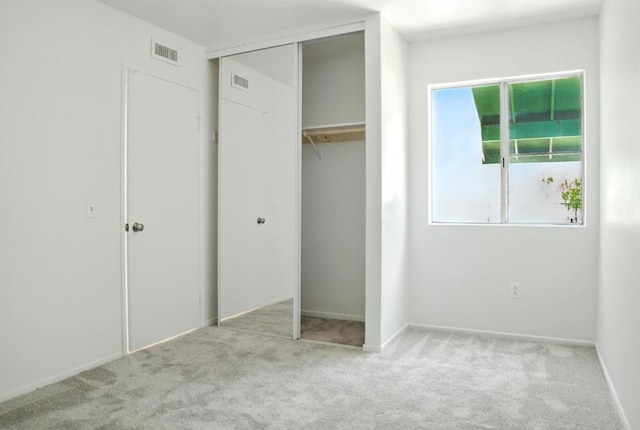 1817 E Grand Ave Unit 6, Escondido, CA 92027 - unfurnished bedroom with carpet and a closet