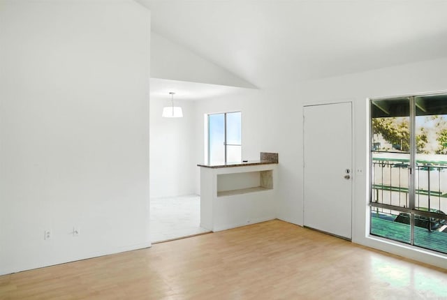 1817 E Grand Ave Unit 6, Escondido, CA 92027 - empty room featuring lofted ceiling and light wood finished floors
