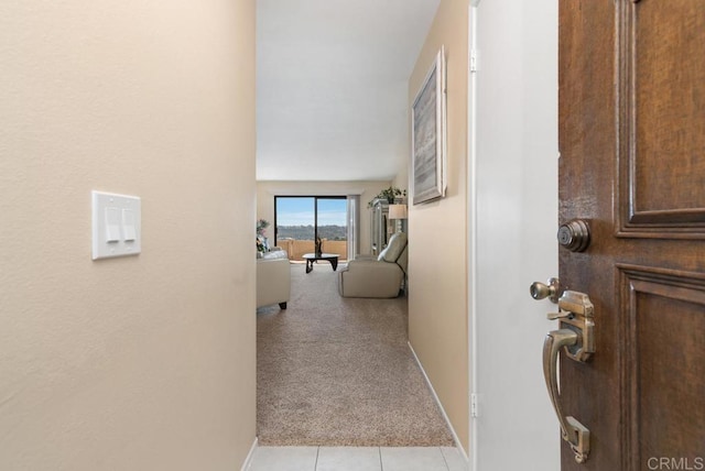 245 Fairlee Ln, Encinitas, CA 92024 - hallway featuring light carpet and light tile patterned flooring