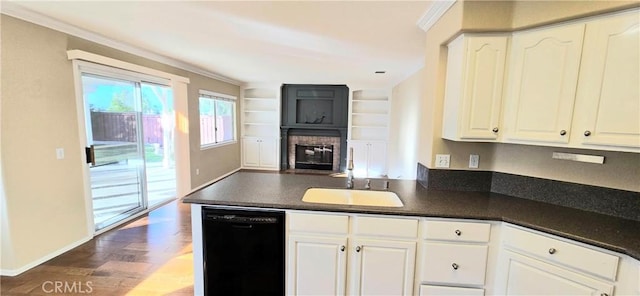 31864 Corte Montecito, Temecula, CA 92592 - kitchen featuring dishwasher, dark countertops, a peninsula, white cabinetry, and crown molding