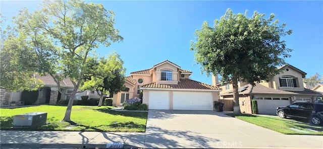 31864 Corte Montecito, Temecula, CA 92592 - mediterranean / spanish-style home with stucco siding, a tile roof, concrete driveway, a front lawn, and a garage