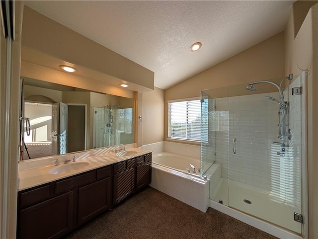 31864 Corte Montecito, Temecula, CA 92592 - full bath with vaulted ceiling, a shower stall, a bath, double vanity, and a textured ceiling
