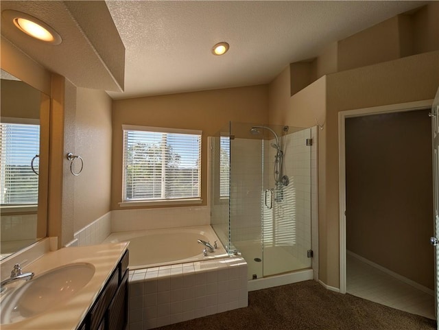 31864 Corte Montecito, Temecula, CA 92592 - full bath with lofted ceiling, a stall shower, a bath, vanity, and a textured ceiling