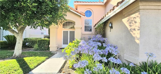 31864 Corte Montecito, Temecula, CA 92592 - doorway to property featuring stucco siding and a tile roof