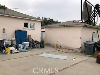9611 Mallison Ave, South Gate, CA 90280 - view of home's exterior featuring stucco siding and a patio