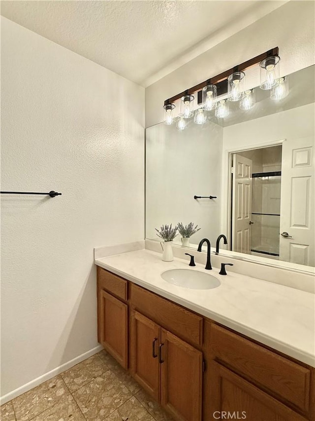 18 Decente, Irvine, CA 92614 - full bathroom featuring vanity, a shower, and a textured ceiling