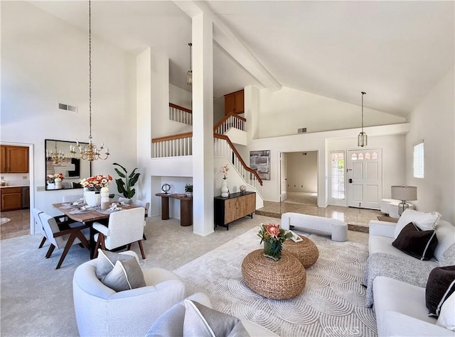 18 Decente, Irvine, CA 92614 - living area with high vaulted ceiling, stairway, light carpet, beamed ceiling, and a chandelier