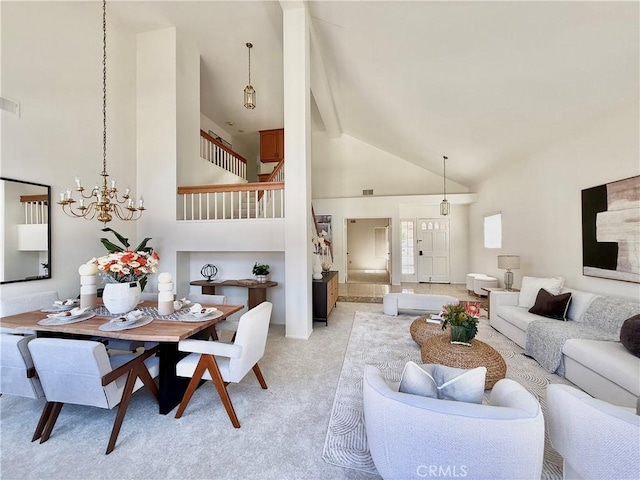 18 Decente, Irvine, CA 92614 - living room with high vaulted ceiling, beamed ceiling, light colored carpet, stairway, and a chandelier