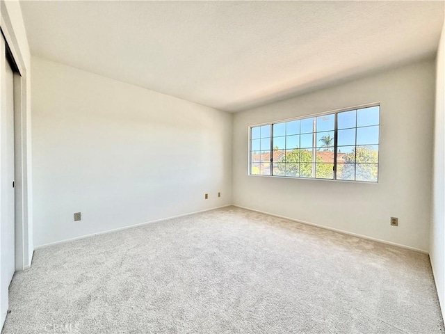 18 Decente, Irvine, CA 92614 - empty room with carpet floors and baseboards