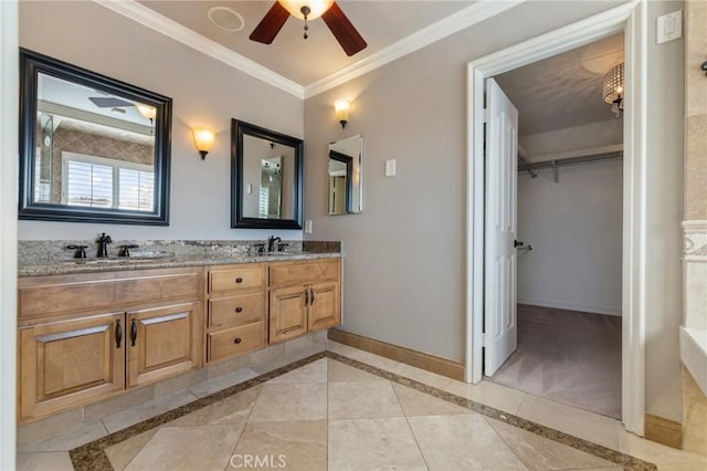 29 Hemingway Ct, Trabuco Canyon, CA 92679 - bathroom with double vanity, ornamental molding, a ceiling fan, and a spacious closet